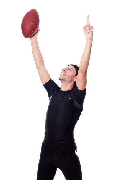 Man training with american football on white - Foto, afbeelding