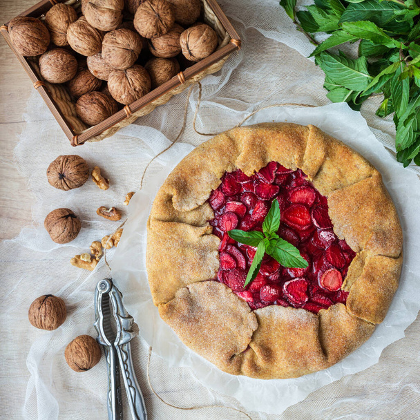 homemade strawberry pie with nuts and mint - Photo, Image