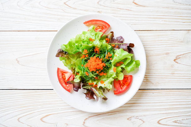 vegetable salad with Japanese seaweed and shrimp eggs - healthy and vegetarian food style - Φωτογραφία, εικόνα