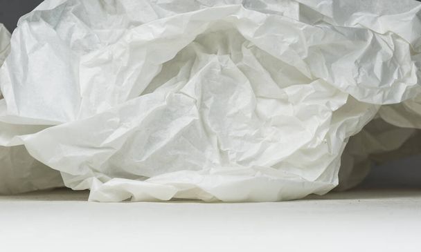 white crumpled paper, studio shot, isolated - Фото, изображение