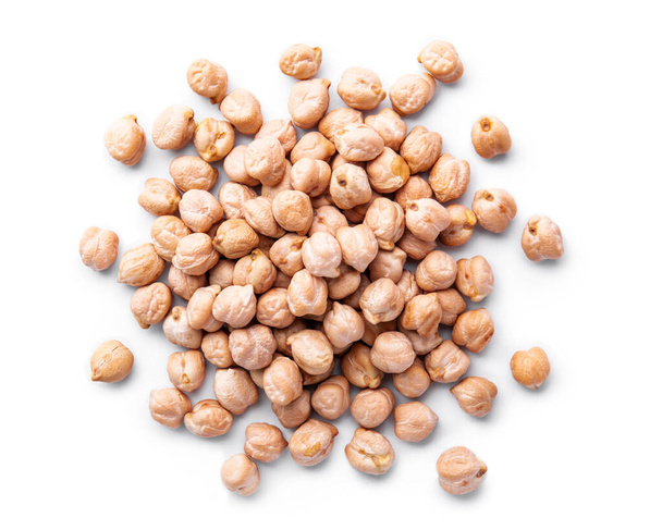 Heap of raw chickpea beans isolated on white background. Healthy vegetarian food concept. Pile of uncooked chickpeas - Photo, Image