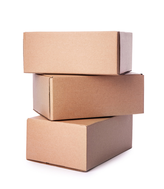 Heap of cardboard boxes isolated on white background. Carton delivery packaging, recycling brown boxes - Photo, Image