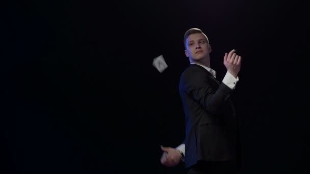 Illusionist showing trick with playing cards - Footage, Video