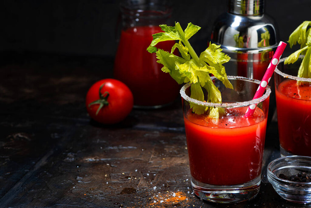 alcoholic cocktail bloody mary on dark background, closeup - Фото, изображение