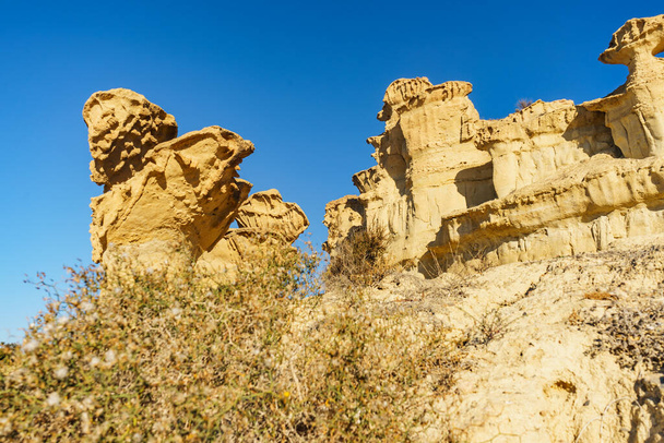 The Enchanted City of Bolnuevo, eroded yellow sandstone formations, Murcia Spain. Tourist attraction. - Foto, afbeelding