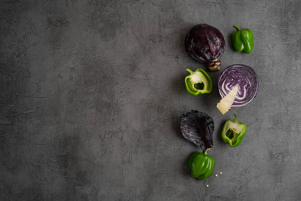 top view of colored ripe vegetables on gray surface - Фото, зображення