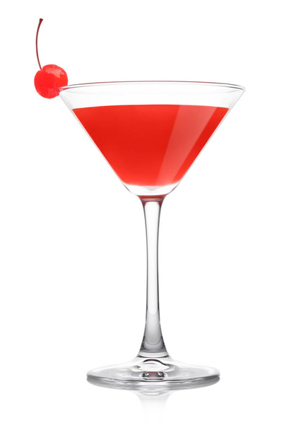 Cosmopolitan cocktail in classic crystal glass with pink cherry on white background. - Photo, Image
