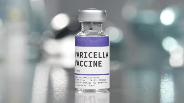 Varicella vaccine vial in medical lab slowly rotating around. - Metraje, vídeo