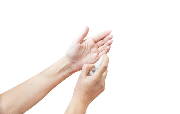 Use of antiseptic spray based on alcohol for hands on a white background - Valokuva, kuva