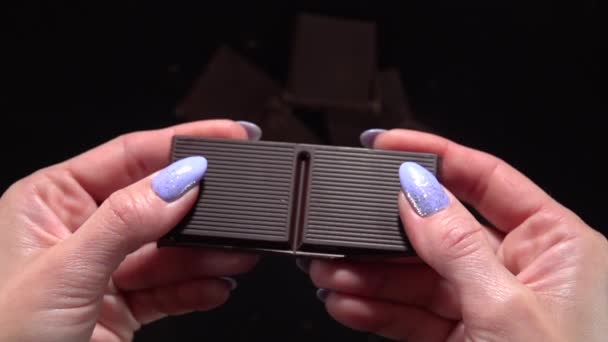 Break a bar of chocolate. Slow Motion 500fps - Footage, Video