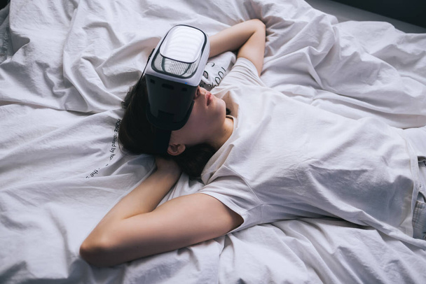 Woman uses virtual reality glasses. - Photo, Image