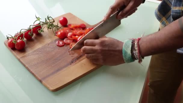 Close up chef preparing organic cherry tomatoes at home - Záběry, video