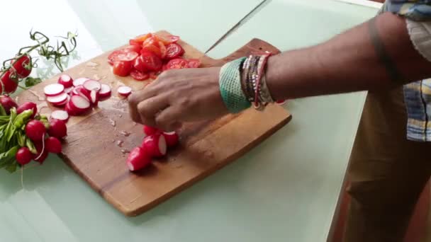 Close up chef preparing organic cherry tomatoes at home - Filmati, video