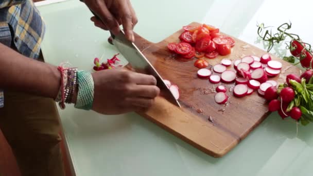 Close up chef preparing organic cherry tomatoes at home - Кадры, видео