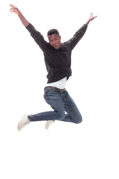 Αστείος τύπος που πηδάει και σηκώνει τους αντίχειρες. απομονωμένο σε λευκό - Φωτογραφία, εικόνα