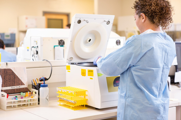 Scientist Using PCR Machine In Laboratory - Photo, image