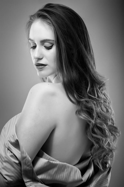Black and white image of a seductive young woman - Photo, Image
