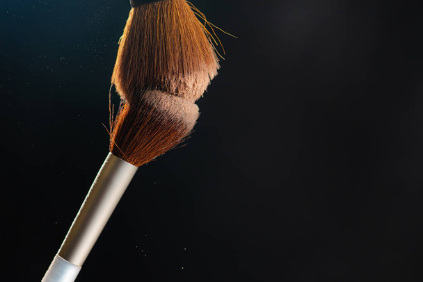 cosmetic brushes isolated on dark background - Fotoğraf, Görsel