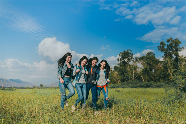 Group of Young Asian women walking enjoy travel trekking to destination in vacation time for go to camping. - Фото, изображение