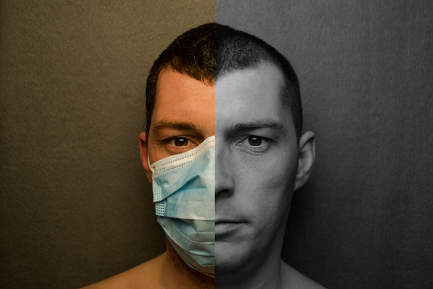 Das Gesicht des Mannes ist mit einer medizinischen Maske bedeckt, grauer Hintergrund - Foto, Bild