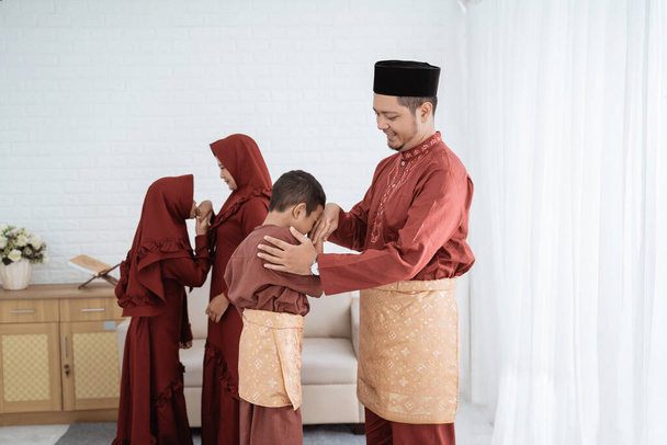 children kissing his parent hand wish happy Ramadan Kareem - Photo, image