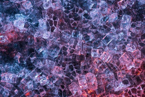top view of colorful abstract blue, red and purple glass textured background - Фото, зображення
