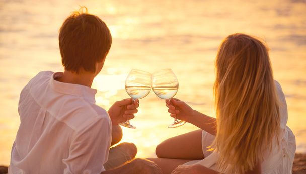 Honeymoon concept, Man and Woman in love, Couple enjoying glass - Φωτογραφία, εικόνα
