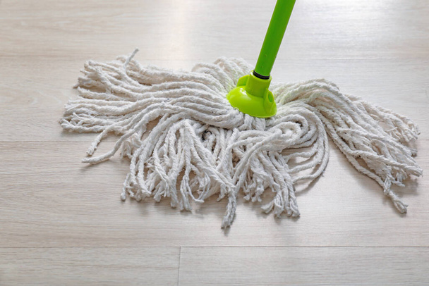 Cleaning of floor with mop - Φωτογραφία, εικόνα
