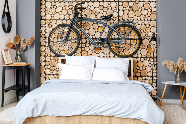 Interior of modern bedroom with bicycle - Foto, imagen