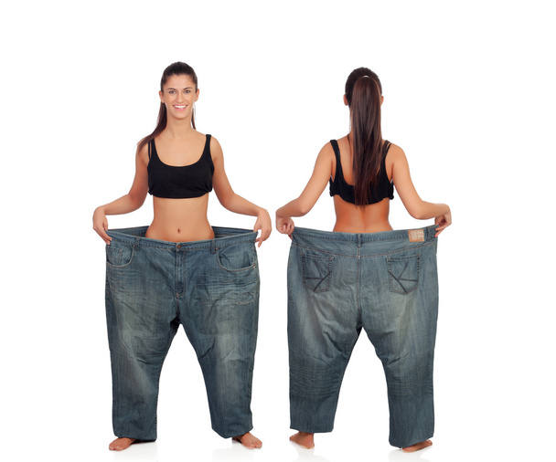 Вид вперед и за тонкой девушкой с большими брюками
 - Фото, изображение