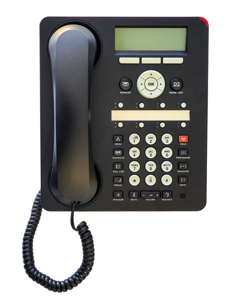Primer plano de Vista superior del nuevo teléfono de oficina negro con pantalla verde. Aislado sobre fondo blanco. Fotografía macro de alta calidad
. - Foto, Imagen