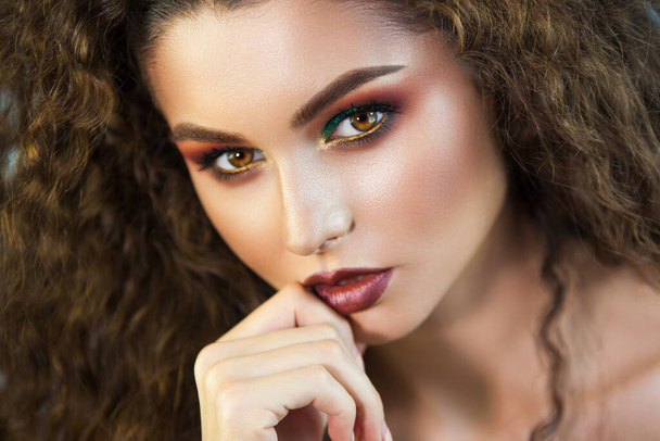 Portrait of beautiful girl professional make-up artist - Foto, Imagen