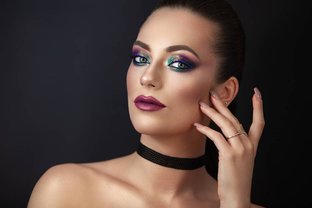 girl model, portrait with makeup on a dark background. - Fotó, kép