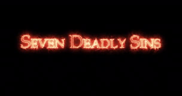 Seven deadly sins written with fire. Loop - Footage, Video