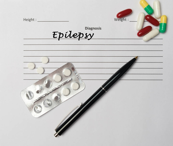 Epilepsy diagnosis written on a white piece of paper. Medical concept - Foto, imagen