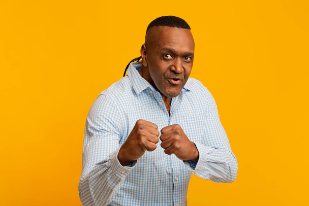 Mature african american man with fight gesture - Photo, Image