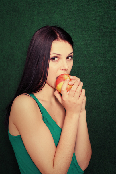 women playing with apple - 写真・画像