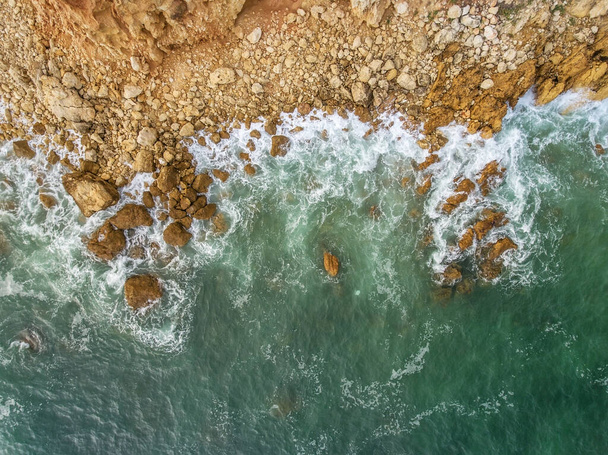 Waves beat against the shore, the view from the sky. Portugal - Valokuva, kuva