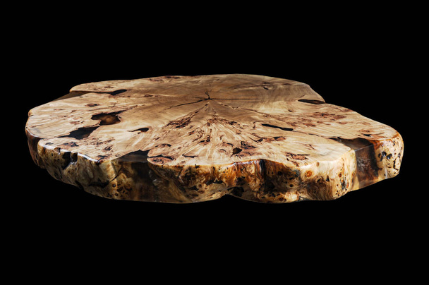 Solid elm countertop. Wood surface cross section of elm tree. Live slab. Isolated on a black. Woodworking, carpentry production. Furniture manufacture. Wooden table with epoxy resin filling. - Zdjęcie, obraz