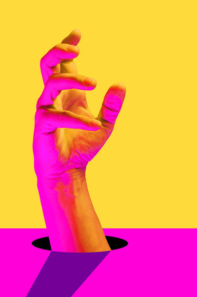 Hand in a pop art collage style in neon bold colors. Modern psychedelic creative element with human palm for posters, banners, wallpaper. Copy space for text. Magazine style template. Zine culture. - Foto, Bild