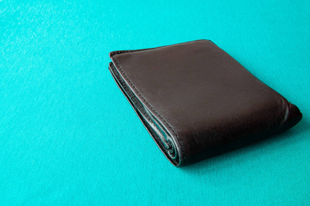 Empty wallet with no money in the background.Bankruptcy is an empty wallet.It is not possible to repay the loan and mortgage.Old and empty black wallet - 写真・画像