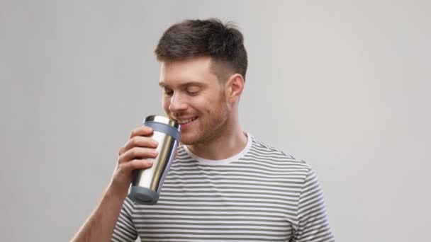 man with thermo cup or tumbler for hot drinks - Video