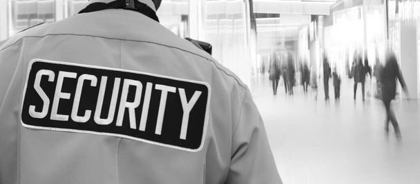 Security Representative Watches Supermarket Visitors - Fotoğraf, Görsel