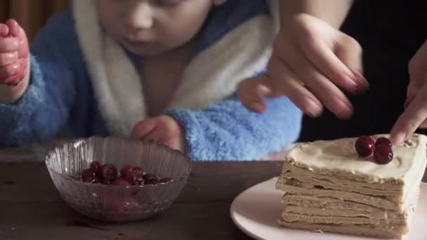 Cake spread with cherry berries - Кадры, видео