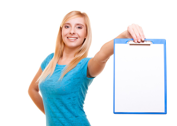Woman college student girl holds clipboard and points - Foto, imagen