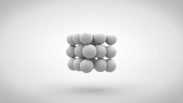 3D-Animation eines Würfels, der sich in mehrere Würfel aufteilt. Würfel verwandeln sich in Kugeln, die zufällig im Raum verteilt und zu einem Würfel zusammengefasst werden. Animation mit der Fähigkeit zur kontinuierlichen Wiedergabe. - Filmmaterial, Video