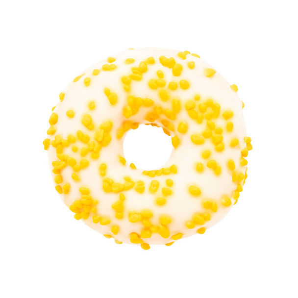 Valkoinen donitsi keltainen sprinkles eristetty valkoisella taustalla leikkausreitillä
 - Valokuva, kuva