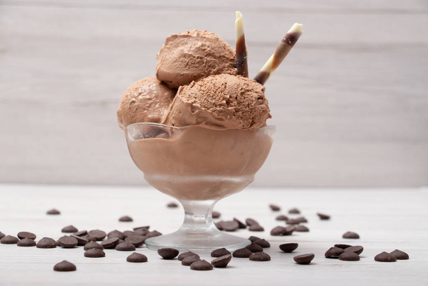 Chocolate ice cream ball in a glass - Фото, изображение