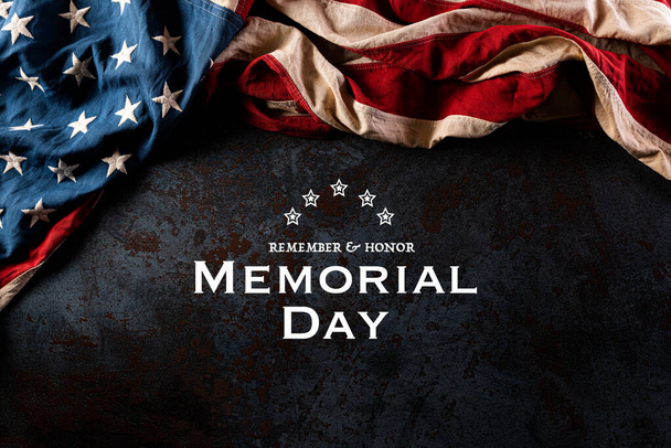 Happy Memorial Day. American flags with the text REMEMBER & HONOR against a black stone texture background. May 25. - Photo, Image
