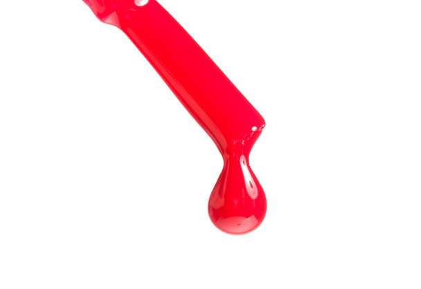 druipend van rode nagel vernis - Foto, afbeelding